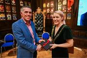 28 April 2025; Chairperson; Member of Governance and Nominations Committee and Remuneration Committee Dr. Brendan O’Brien presents a gift to Lord Mayor of Dublin Cllr Emma Blain at the Team Ireland World Winter Games celebration at The Mansion House in Dublin. Photo by Tyler Miller/Sportsfile