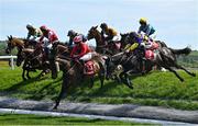 29 April 2025; Runners and riders jump Ruby's Double during The Kildare Hunt Club Cross Country Chase for the Ladies Perpetual Cup on day one of the Punchestown Festival at Punchestown Racecourse in Kildare. Photo by David Fitzgerald/Sportsfile