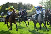 29 April 2025; Buy Some Time, with Ben Smith up, centre, (red and black colours) on their way to winning The Albert Bartlett Triple Crown Series Final on day one of the Punchestown Festival at Punchestown Racecourse in Kildare. Photo by David Fitzgerald/Sportsfile