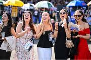 29 April 2025; Racegoers, from left, Ellie McNamee, Samantha Tansey, Ellie Doherty, Nicola Kirwan and Sophie Kirwan react during The Killashee Hotel Handicap Hurdle on day one of the Punchestown Festival at Punchestown Racecourse in Kildare. Photo by David Fitzgerald/Sportsfile