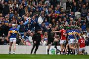 27 April 2025; Tipperary manager Liam Cahill and supporters react as line umpire Sean Stadk awards a sideline ball to Cork during the Munster GAA Hurling Senior Championship Round 2 match between Cork and Tipperary at SuperValu Páirc Uí Chaoimh in Cork. Photo by Brendan Moran/Sportsfile