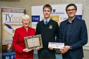 30 April 2025; National TY Short Story Competition shortlisted student Harry Valentine, from Old Bawn Community School in Tallaght, Dublin, is presented with her prize by Judging Chairperson Mary Hanafin and School Print Resources managing director Niall Morrissey at the National TY Short Story Competition Awards at Buswells Hotel in Dublin. Photo by Brendan Moran/Sportsfile