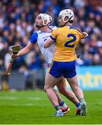 27 April 2025; Adam Hogan of Clare and Dessie Hutchinson of Waterford tussle during the Munster GAA Hurling Senior Championship Round 2 match between Waterford and Clare at Walsh Park in Waterford. Photo by Piaras Ó Mídheach/Sportsfile