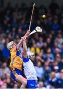 27 April 2025; Adam Hogan of Clare in action against Dessie Hutchinson of Waterford during the Munster GAA Hurling Senior Championship Round 2 match between Waterford and Clare at Walsh Park in Waterford. Photo by Piaras Ó Mídheach/Sportsfile