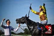 30 April 2025; Paul Townend celebrates on Galopin Des Champs, along with groom Adam Connolly, after winning the Ladbrokes Punchestown Gold Cup Chase on day two of the Punchestown Festival at Punchestown Racecourse in Kildare. Photo by David Fitzgerald/Sportsfile