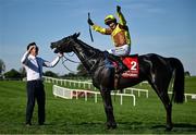 30 April 2025; Paul Townend celebrates on Galopin Des Champs, along with groom Adam Connolly, after winning the Ladbrokes Punchestown Gold Cup Chase on day two of the Punchestown Festival at Punchestown Racecourse in Kildare. Photo by David Fitzgerald/Sportsfile