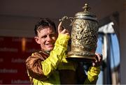 30 April 2025; Paul Townend celebrates with the cup after winning the Ladbrokes Punchestown Gold Cup Chase on Galopin Des Champs on day two of the Punchestown Festival at Punchestown Racecourse in Kildare. Photo by David Fitzgerald/Sportsfile