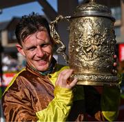 30 April 2025; Paul Townend celebrates with the cup after winning the Ladbrokes Punchestown Gold Cup Chase on Galopin Des Champs on day two of the Punchestown Festival at Punchestown Racecourse in Kildare. Photo by David Fitzgerald/Sportsfile