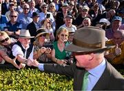 30 April 2025; Trainer Willie Mullins is congratulated by spectators after winning the Ladbrokes Punchestown Gold Cup Chase with Galopin Des Champs on day two of the Punchestown Festival at Punchestown Racecourse in Kildare. Photo by David Fitzgerald/Sportsfile
