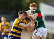 30 April 2025; Darragh Bernie of Mayo in action against Conor Kelly of Roscommon during the Dalata Hotel Group Connacht GAA Football U20 Championship final match between Mayo and Roscommon at Tuam Stadium in Galway. Photo by Thomas Flinkow/Sportsfile