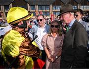 30 April 2025; Jockey Paul Townend with Greg and Audrey Turley, owner of Galopin Des Champs, and trainer Willie Mullins after winning the Ladbrokes Punchestown Gold Cup Chase on day two of the Punchestown Festival at Punchestown Racecourse in Kildare. Photo by David Fitzgerald/Sportsfile