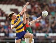 30 April 2025; Tommy Morris of Roscommon in action against Niall Hurley of Mayo during the Dalata Hotel Group Connacht GAA Football U20 Championship final match between Mayo and Roscommon at Tuam Stadium in Galway. Photo by Thomas Flinkow/Sportsfile
