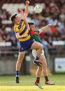30 April 2025; Tommy Morris of Roscommon in action against Niall Hurley of Mayo during the Dalata Hotel Group Connacht GAA Football U20 Championship final match between Mayo and Roscommon at Tuam Stadium in Galway. Photo by Thomas Flinkow/Sportsfile
