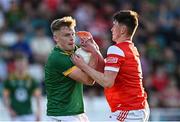 30 April 2025; Tadgh Martyn of Meath in action against Michéal Reid of Louth during the Dalata Hotel Group Leinster GAA Football U20 Championship final match between Meath and Louth at Cedral St Conleth’s Park in Newbridge, Kildare. Photo by Seb Daly/Sportsfile