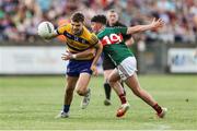 30 April 2025; Rory Carthy of Roscommon in action against Yousif Coghill of Mayo during the Dalata Hotel Group Connacht GAA Football U20 Championship final match between Mayo and Roscommon at Tuam Stadium in Galway. Photo by Thomas Flinkow/Sportsfile