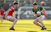 30 April 2025; John Harkin of Meath in action against Conor McGinty of Louth during the Dalata Hotel Group Leinster GAA Football U20 Championship final match between Meath and Louth at Cedral St Conleth’s Park in Newbridge, Kildare. Photo by Seb Daly/Sportsfile