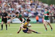 30 April 2025; John McGuinness of Roscommon in action against Paul Gilmore of Mayo during the Dalata Hotel Group Connacht GAA Football U20 Championship final match between Mayo and Roscommon at Tuam Stadium in Galway. Photo by Thomas Flinkow/Sportsfile