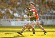 30 April 2025; Finn White of Meath in action against Conor Mac Croista of Louth during the Dalata Hotel Group Leinster GAA Football U20 Championship final match between Meath and Louth at Cedral St Conleth’s Park in Newbridge, Kildare. Photo by Seb Daly/Sportsfile
