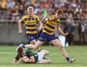 30 April 2025; John MacMonagle of Mayo is tackled by Brian Greene of Roscommon during the Dalata Hotel Group Connacht GAA Football U20 Championship final match between Mayo and Roscommon at Tuam Stadium in Galway. Photo by Thomas Flinkow/Sportsfile