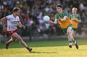 30 April 2025; Callum McCrea of Donegal in action against Conor O'Neill of Tyrone during the Dalata Hotel Group Ulster GAA Football U20 Championship final match between Donegal and Tyrone at Owenbeg Derry GAA Centre in Dungiven, Derry. Photo by Piaras Ó Mídheach/Sportsfile