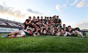 30 April 2025; Mayo players celebrate with the cup after their side's victory in the Dalata Hotel Group Connacht GAA Football U20 Championship final match between Mayo and Roscommon at Tuam Stadium in Galway. Photo by Thomas Flinkow/Sportsfile