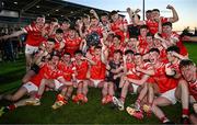 30 April 2025; Louth players celebrate with the trophy after their side's victory in the Dalata Hotel Group Leinster GAA Football U20 Championship final match between Meath and Louth at Cedral St Conleth’s Park in Newbridge, Kildare. Photo by Seb Daly/Sportsfile