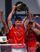 30 April 2025; Louth captain Sean Callaghan lifts the trophy after his side's victory in the Dalata Hotel Group Leinster GAA Football U20 Championship final match between Meath and Louth at Cedral St Conleth’s Park in Newbridge, Kildare. Photo by Seb Daly/Sportsfile