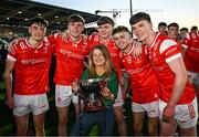 30 April 2025; Louth players, from left, Michéal Reid, Dylan Shelvin, Ryan Shevlin, Adam Gillespie and Keelin Martin celebrate with their teacher Bridget Smith, head of sixth year at Ardee Community School, after the Dalata Hotel Group Leinster GAA Football U20 Championship final match between Meath and Louth at Cedral St Conleth’s Park in Newbridge, Kildare. Photo by Seb Daly/Sportsfile