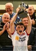 30 April 2025; Tyrone captain Joey Clarke lifts the cup after his side's victory in the Dalata Hotel Group Ulster GAA Football U20 Championship final match between Donegal and Tyrone at Owenbeg Derry GAA Centre in Dungiven, Derry. Photo by Piaras Ó Mídheach/Sportsfile