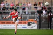 30 April 2025; Tony McDonnell of Louth kicks a free during the Dalata Hotel Group Leinster GAA Football U20 Championship final match between Meath and Louth at Cedral St Conleth’s Park in Newbridge, Kildare. Photo by Seb Daly/Sportsfile
