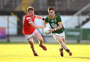 30 April 2025; Ben Corkery of Meath in action against Padric Tinnelly of Louth during the Dalata Hotel Group Leinster GAA Football U20 Championship final match between Meath and Louth at Cedral St Conleth’s Park in Newbridge, Kildare. Photo by Seb Daly/Sportsfile