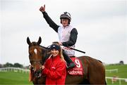 1 May 2025; Jockey Sam Ewing celebrates on Teahupoo after winning the Ladbrokes Champion Stayers Hurdle during day three of the Punchestown Festival at Punchestown Racecourse in Kildare. Photo by Seb Daly/Sportsfile