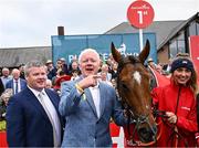 1 May 2025; Winning connections, from left, trainer Gordon Elliott, owner Brian Acheson, Teahupoo, and groom Erika Peciulyte after the Ladbrokes Champion Stayers Hurdle during day three of the Punchestown Festival at Punchestown Racecourse in Kildare. Photo by Seb Daly/Sportsfile
