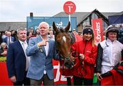 1 May 2025; Winning connections, from left, trainer Gordon Elliott, owner Brian Acheson, Teahupoo, groom Erika Peciulyte and jockey Sam Ewing after the Ladbrokes Champion Stayers Hurdle during day three of the Punchestown Festival at Punchestown Racecourse in Kildare. Photo by Seb Daly/Sportsfile