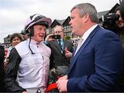 1 May 2025; Jockey Sam Ewing and trainer Gordon Elliott after sending out Teahupoo to win the Ladbrokes Champion Stayers Hurdle during day three of the Punchestown Festival at Punchestown Racecourse in Kildare. Photo by Seb Daly/Sportsfile