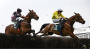 1 May 2025; Aspire Tower, left, with Mike O'Connor up, and Dutch Schultz, right, with Conor Stone-Walsh up, during the Frontline Security Handicap Steeplechase on day three of the Punchestown Festival at Punchestown Racecourse in Kildare. Photo by Seb Daly/Sportsfile
