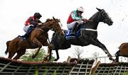 1 May 2025; Timetoshine, right, with James Bowen up, and Royal Hollow, left, with Cian Micheal Quirke up, during the Close Brothers Irish EBF Mares Novice Hurdle on day three of the Punchestown Festival at Punchestown Racecourse in Kildare. Photo by Seb Daly/Sportsfile