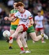 30 April 2025; Conall Sheehy of Tyrone in action against Cathal 'Rua' Ó Gallchoir of Donegal during the Dalata Hotel Group Ulster GAA Football U20 Championship final match between Donegal and Tyrone at Owenbeg Derry GAA Centre in Dungiven, Derry. Photo by Piaras Ó Mídheach/Sportsfile