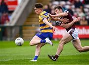 20 April 2025; Daire Cregg of Roscommon shoots under pressure from Liam Silke of Galway before the Connacht GAA Football Senior Championship semi-final match between Galway and Roscommon at Pearse Stadium in Galway. Photo by Piaras Ó Mídheach/Sportsfile