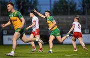 30 April 2025; Seanan Carr of Donegal celebrates scoring his side's second goal during the Dalata Hotel Group Ulster GAA Football U20 Championship final match between Donegal and Tyrone at Owenbeg Derry GAA Centre in Dungiven, Derry. Photo by Piaras Ó Mídheach/Sportsfile