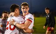30 April 2025; Tyrone players Conor O'Neill, right, and Eoin Donaghy celebrate after their side's victory in the Dalata Hotel Group Ulster GAA Football U20 Championship final match between Donegal and Tyrone at Owenbeg Derry GAA Centre in Dungiven, Derry. Photo by Piaras Ó Mídheach/Sportsfile