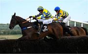 2 May 2025; Fountain House, left, with Eoin Mahon up, jumps the last on their way to winning the Stanley Asphalt Hunters Steeplechase for the Bishopscourt Cup, from eventual third place Eyes Off Annie, right, with Maxine O'Sullivan up, on day four of the Punchestown Festival at Punchestown Racecourse in Kildare. Photo by Seb Daly/Sportsfile