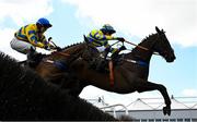 2 May 2025; Fountain House, right, with Eoin Mahon up, jumps the last on their way to winning the Stanley Asphalt Hunters Steeplechase for the Bishopscourt Cup, from eventual third place Eyes Off Annie, left, with Maxine O'Sullivan up, on day four of the Punchestown Festival at Punchestown Racecourse in Kildare. Photo by Seb Daly/Sportsfile