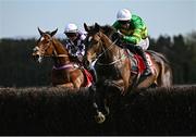 2 May 2025; Its On The Line, right, with Derek O'Connor up, jumps the last on their way to winning the Event Power Champion Hunters Steeplechase, from eventual second place Viroflay, left, with Olive Nicholls up, on day four of the Punchestown Festival at Punchestown Racecourse in Kildare. Photo by Seb Daly/Sportsfile