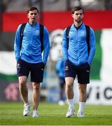 2 May 2025; Waterford players Dean McMenamy, left, and Ryan Burke arrive before the SSE Airtricity Men's Premier Division match between Bohemians and Waterford at Dalymount Park in Dublin. Photo by Michael P Ryan/Sportsfile