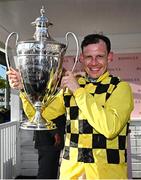 2 May 2025; Jockey Paul Townend with the trophy after winning the Boodles Champion Hurdle on State Man on day four of the Punchestown Festival at Punchestown Racecourse in Kildare. Photo by Seb Daly/Sportsfile