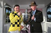 2 May 2025; Jockey Paul Townend and trainer Willie Mullins with the trophy after winning the Boodles Champion Hurdle with State Man on day four of the Punchestown Festival at Punchestown Racecourse in Kildare. Photo by Seb Daly/Sportsfile