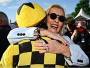 2 May 2025; Owner Marie Donnelly celebrates with jockey Paul Townend after sending out State Man to win the Boodles Champion Hurdle on day four of the Punchestown Festival at Punchestown Racecourse in Kildare. Photo by Seb Daly/Sportsfile
