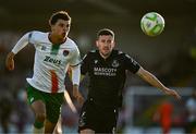 2 May 2025; Aaron Greene of Shamrock Rovers in action against Freddie Anderson of Cork City during the SSE Airtricity Men's Premier Division match between Cork City and Shamrock Rovers at Turner's Cross in Cork. Photo by Brendan Moran/Sportsfile