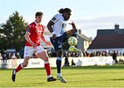 2 May 2025; Thomas Oluwa of Drogheda United in action against Gareth McElroy of Sligo Rovers during the SSE Airtricity Men's Premier Division match between Sligo Rovers and Drogheda United at The Showgrounds in Sligo. Photo by Piaras Ó Mídheach/Sportsfile